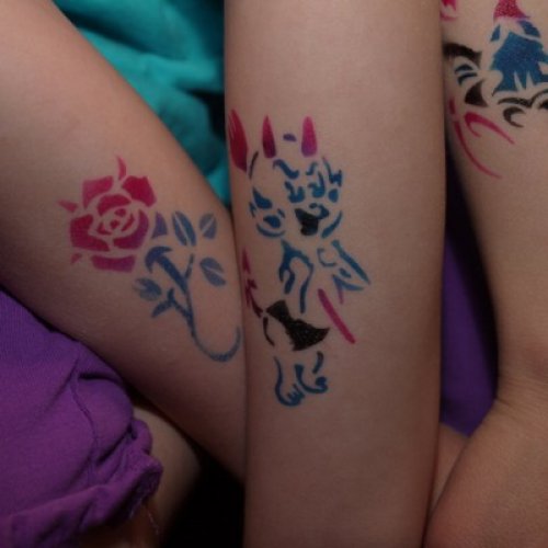 Glitter Tattoos by Inflatable Fun Staff