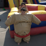   Jr. Sumo Suits Perfect for junior sumo wrestlers. Kids can sumo each other in these padded suits to see who wins the Ultimate Sumo Wrestler challenge. Great for team building, church and school events. Fits people 4’4” to5’2”.. Jr. Sumo Suits Perfect for junior sumo wrestlers. Kids can sumo each other in these padded suits to see who wins the Ultimate Sumo Wrestler challenge. Great for team building, church and school events. Fits people 4’4” to5’2”.
$240 /$295/$355 (4/6/8 hrs respectively)